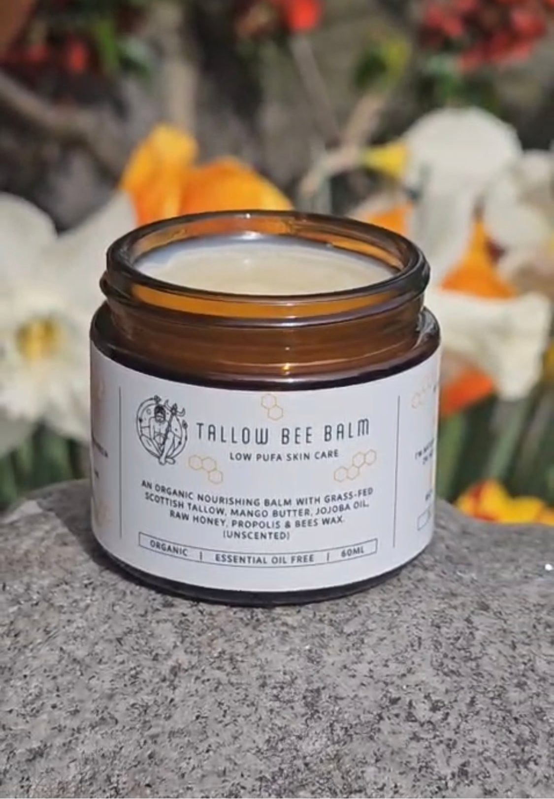 Organic Tallow bee balm infused with propolis and honey , grass fed with a touch of mango butter and bees wax.